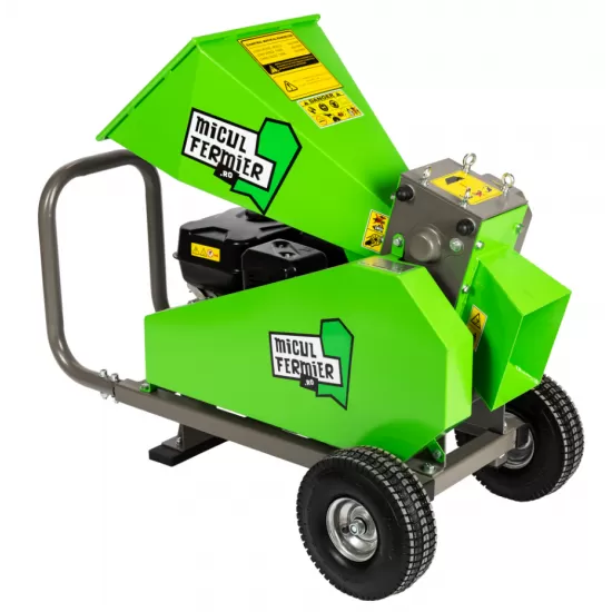 Tocator de crengi Micul Fermier, motor benzina 7 CP, 60 mm diametru maxim de taiere, pentru brichete Tocator de crengi Micul Fermier, motor benzina 7 CP, 60 mm diametru maxim de taiere, pentru brichete