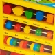 Jucarie de Construit Educativa Montessori Multifunctionala, Multicolor, 35 Piese, Lemn si Plastic