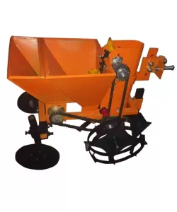 Dispozitiv de plantat şi fertilizat cartofi